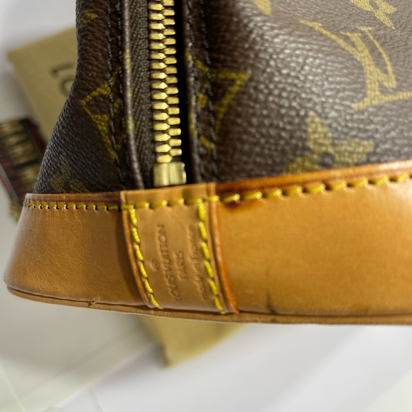 Loui Vuitton Alma in Monogram, with dust bag. - Picture 10 of 16